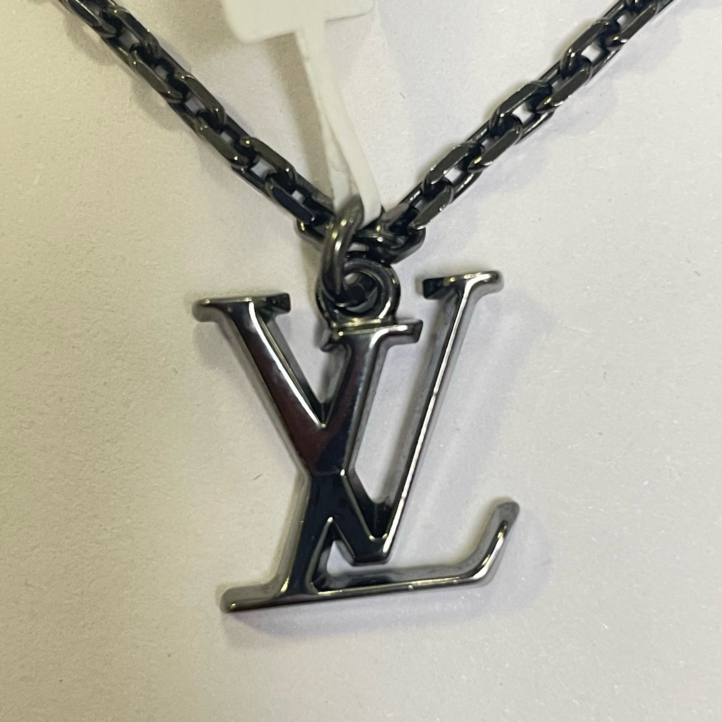 Louis Vuitton Metal Silver Pendant