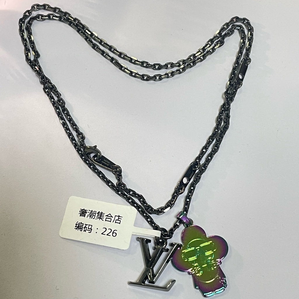 Louis Vuitton Metal Silver Pendant
