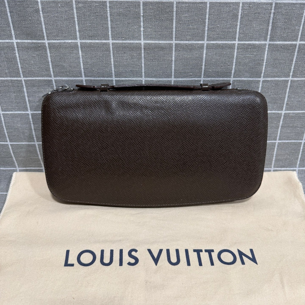 Louis Vuitton Leather Brown Clutch