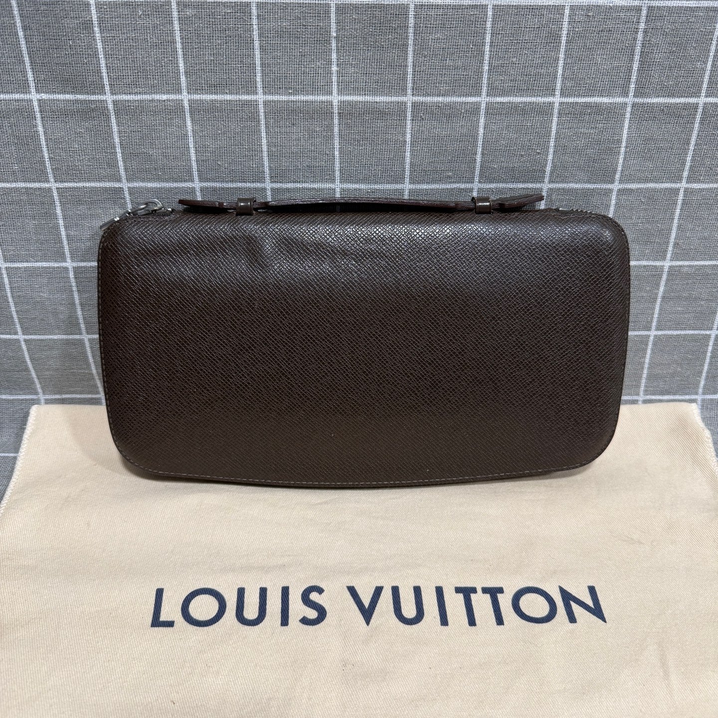 Louis Vuitton Leather Brown Clutch