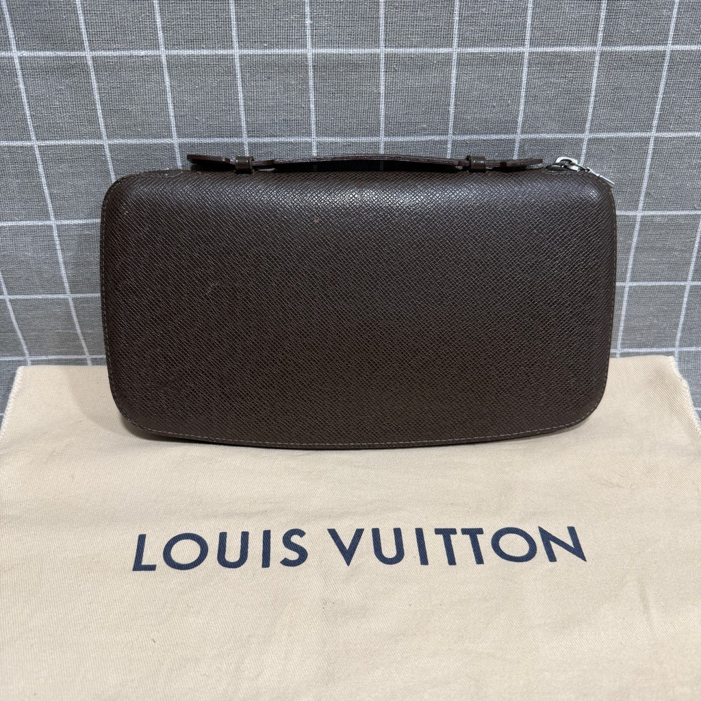 Louis Vuitton Leather Brown Clutch