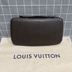 Louis Vuitton Leather Brown Clutch