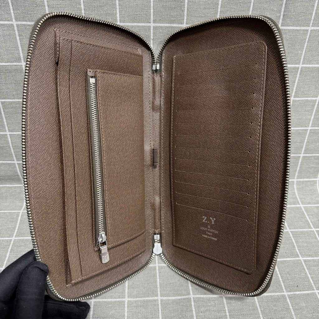 Louis Vuitton Leather Brown Clutch