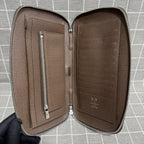Louis Vuitton Leather Brown Clutch