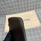 Louis Vuitton Leather Brown Clutch