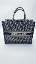 Dior Book Tote White Dimensions: 42 x 35 x 18.5 cm (length x height x width); length from handle top to bag top: 16 cm M1286ZRIW_M828