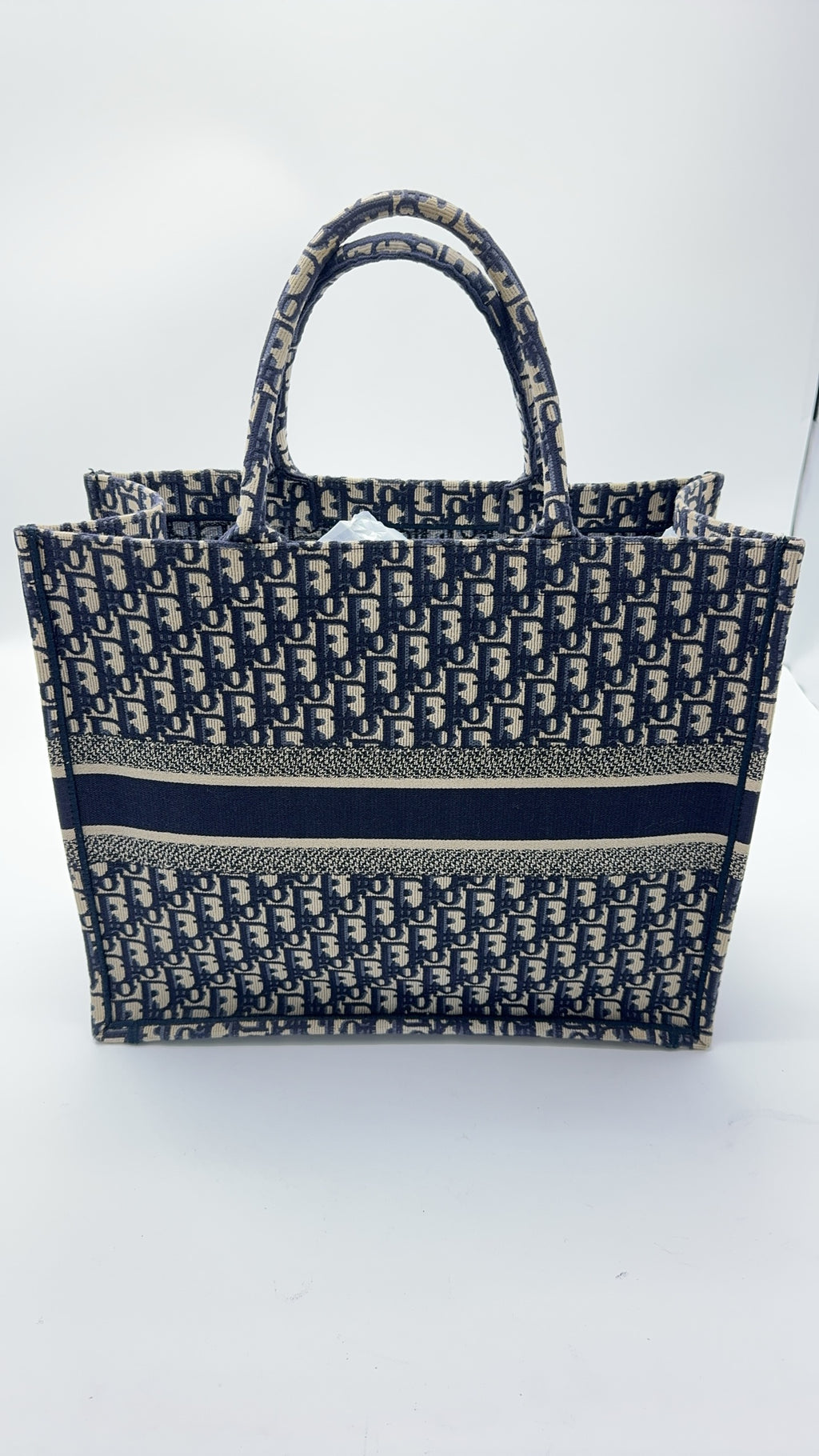 Dior Book Tote White Dimensions: 42 x 35 x 18.5 cm (length x height x width); length from handle top to bag top: 16 cm M1286ZRIW_M828