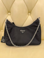 PRADA Prada Re-Edition 2005 Recycled Nylon and Saffiano Leather Handbag Black 18×22×6cm 1BH204_R064_F0002_V_WRK