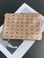 MCM Metal Rose gold Clutch