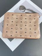 MCM Metal Rose gold Clutch