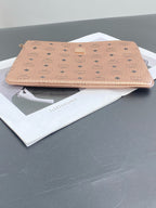 MCM Metal Rose gold Clutch