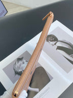 MCM Metal Rose gold Clutch