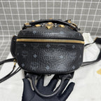 MCM Leather Gold
