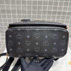 MCM Leather Gold