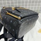 MCM Leather Gold