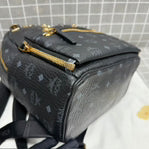 MCM Leather Gold