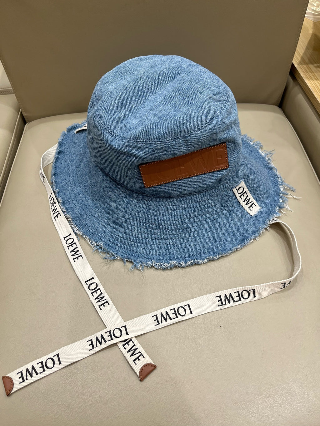 Loewe Tannin-dyed canvas and cowhide raw-edge fisherman hat Brown Bucket hat K820HF1X66-5400
