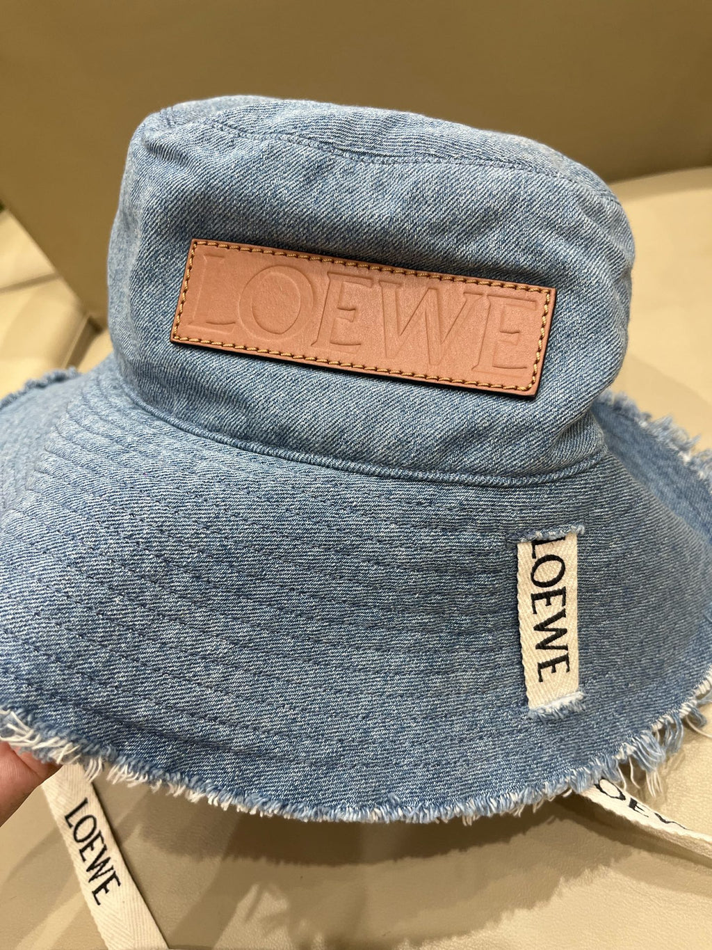 Loewe Tannin-dyed canvas and cowhide raw-edge fisherman hat Brown Bucket hat K820HF1X66-5400