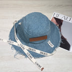 Loewe Tannin-dyed canvas and cowhide raw-edge fisherman hat Brown Bucket hat K820HF1X66-5400