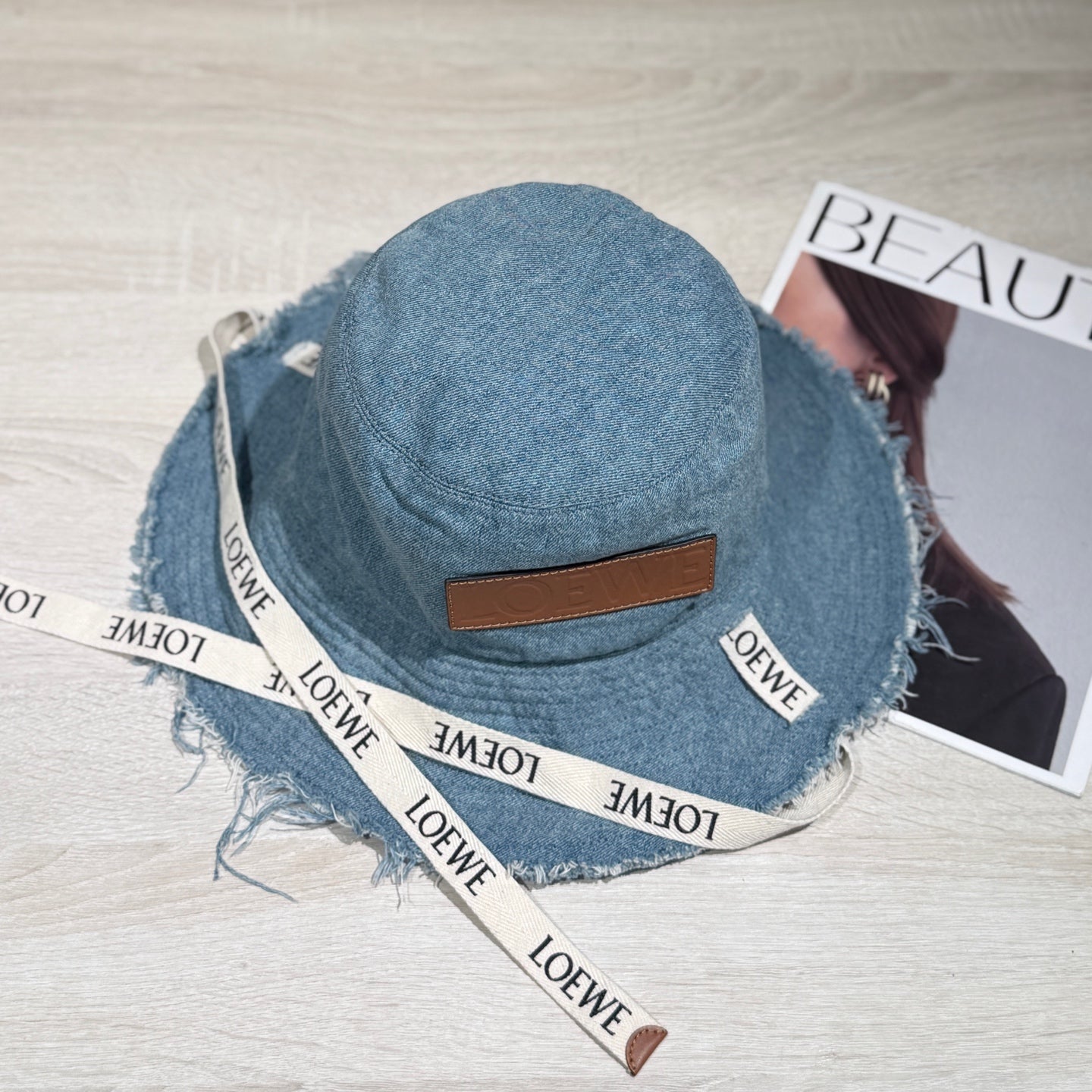 Loewe Tannin-dyed canvas and cowhide raw-edge fisherman hat Brown Bucket hat K820HF1X66-5400