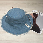 Loewe Tannin-dyed canvas and cowhide raw-edge fisherman hat Brown Bucket hat K820HF1X66-5400