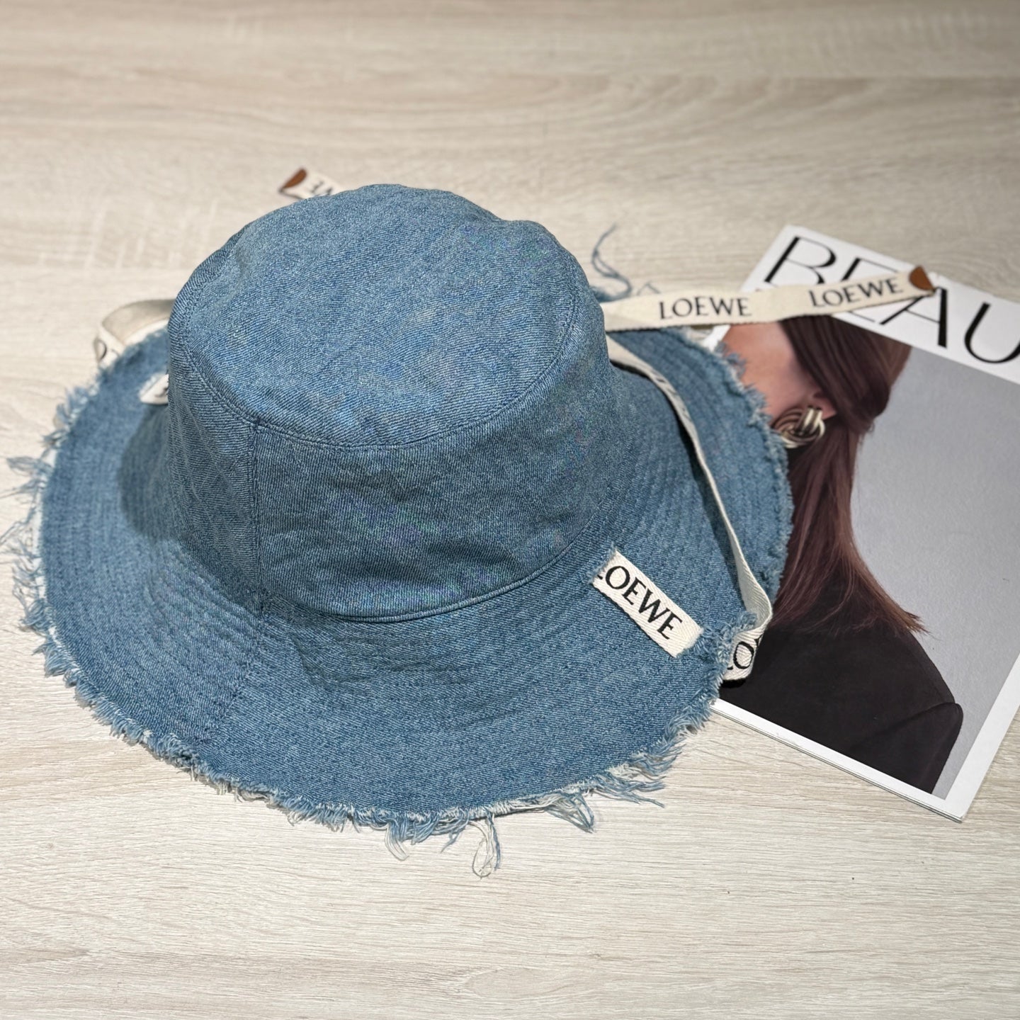 Loewe Tannin-dyed canvas and cowhide raw-edge fisherman hat Brown Bucket hat K820HF1X66-5400