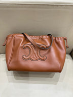 Celine CABAS TRIOMPHE small smooth cowhide drawstring bag Brown 9 x 7 x 5 inches (22.5 x 18 x 13 centimeters) 111013DU3.04LU