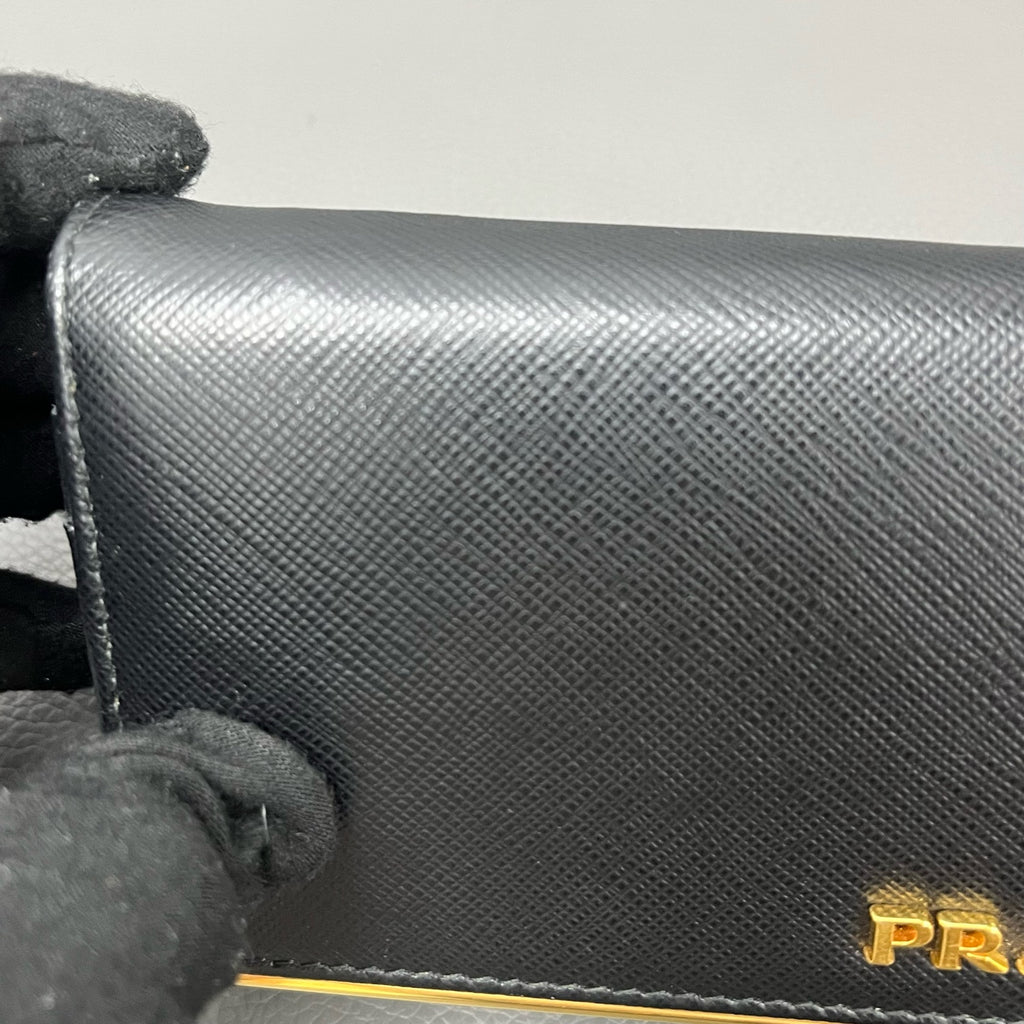 Prada Gold Clutch