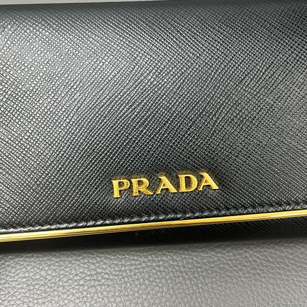 Prada Gold Clutch