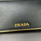 Prada Gold Clutch