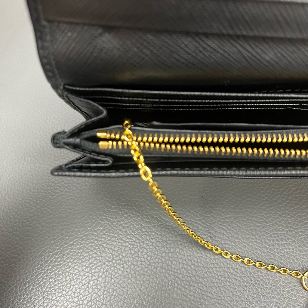 Prada Gold Clutch