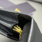 Prada Gold Clutch