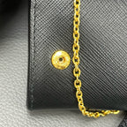 Prada Gold Clutch