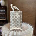 Celine CABAS THAIS small-sized handbag in signature-printed fabric and calfskin leather Leather CONF.199162FRF.01BC