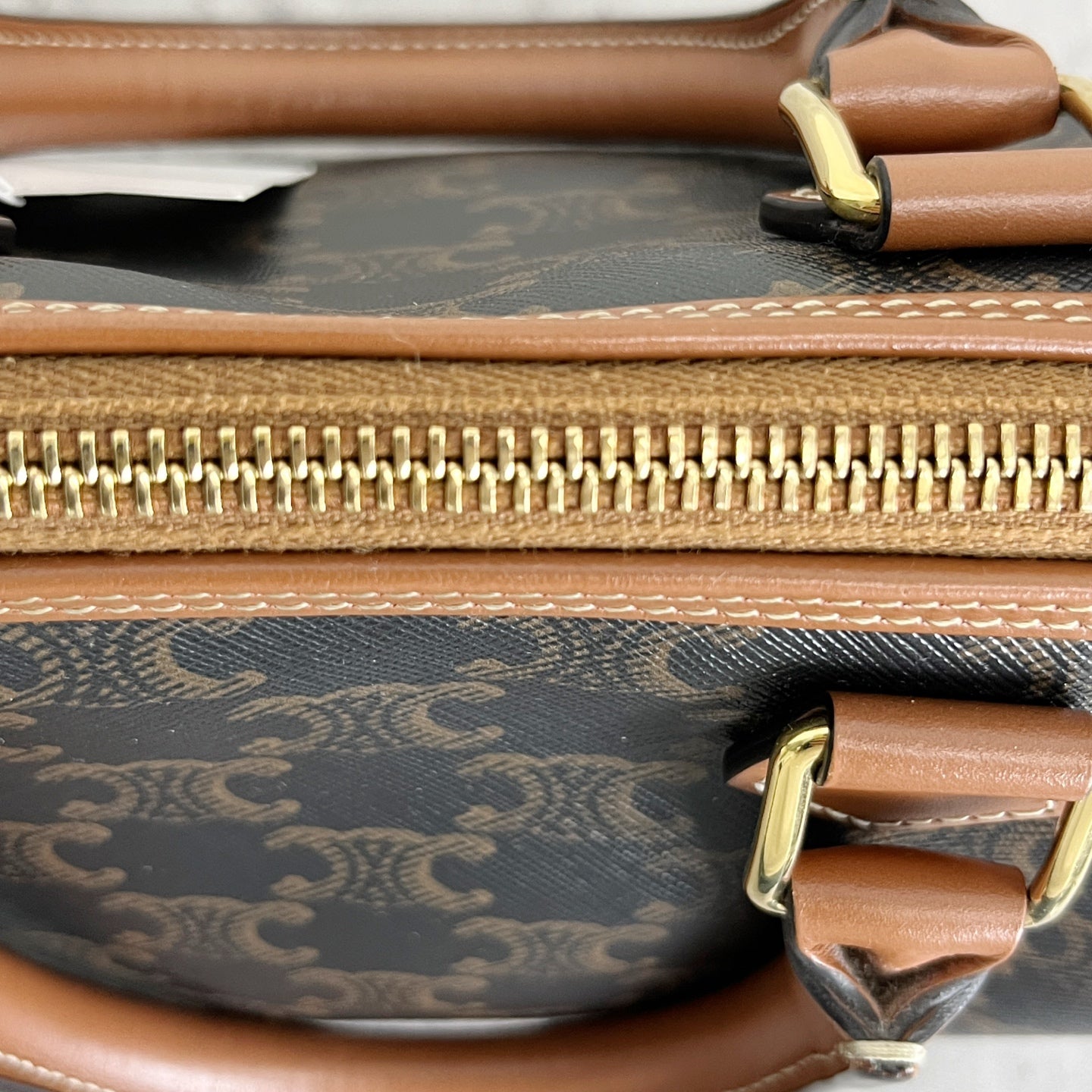 Celine Small logo-printed cowhide Boston bag Brown 113772CAS.04LU