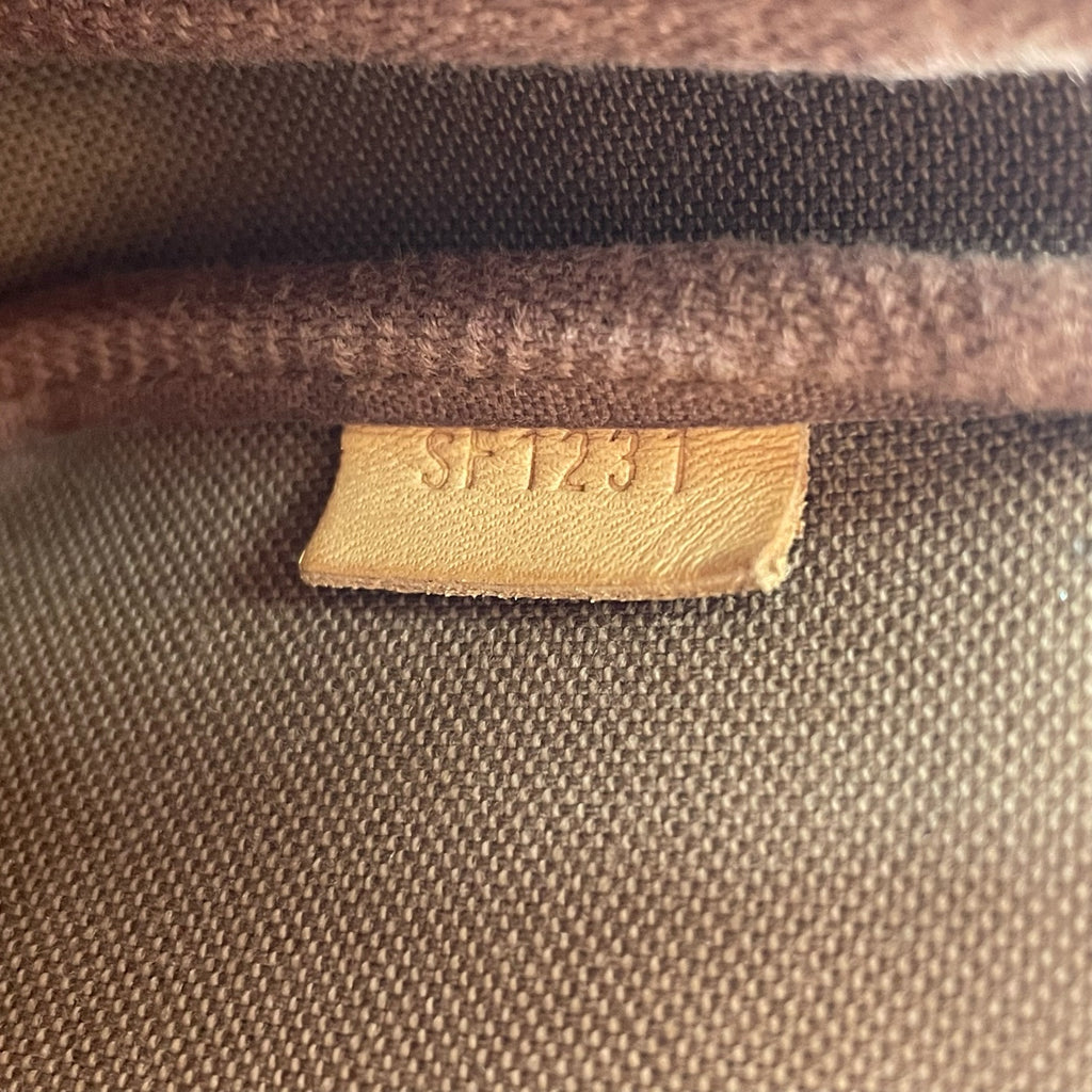 Louis Vuitton Clutch