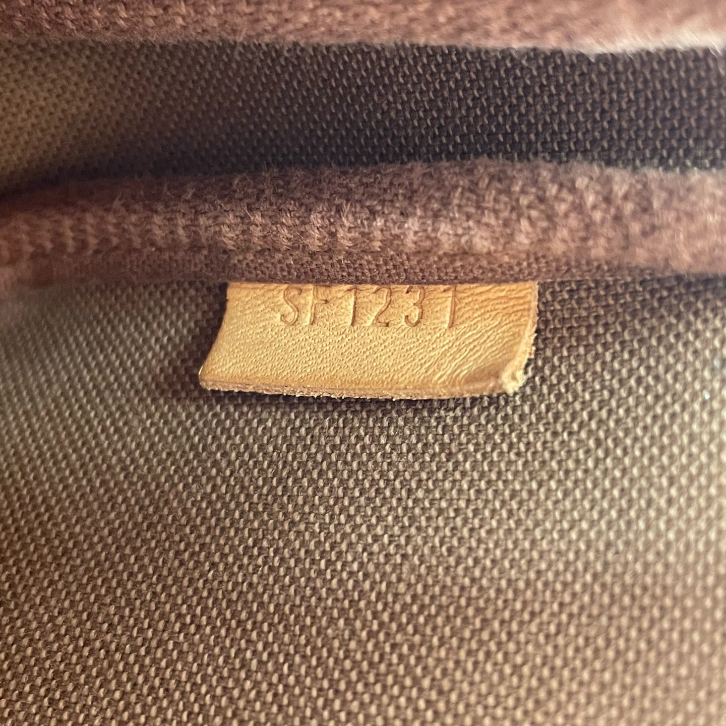 Louis Vuitton Clutch