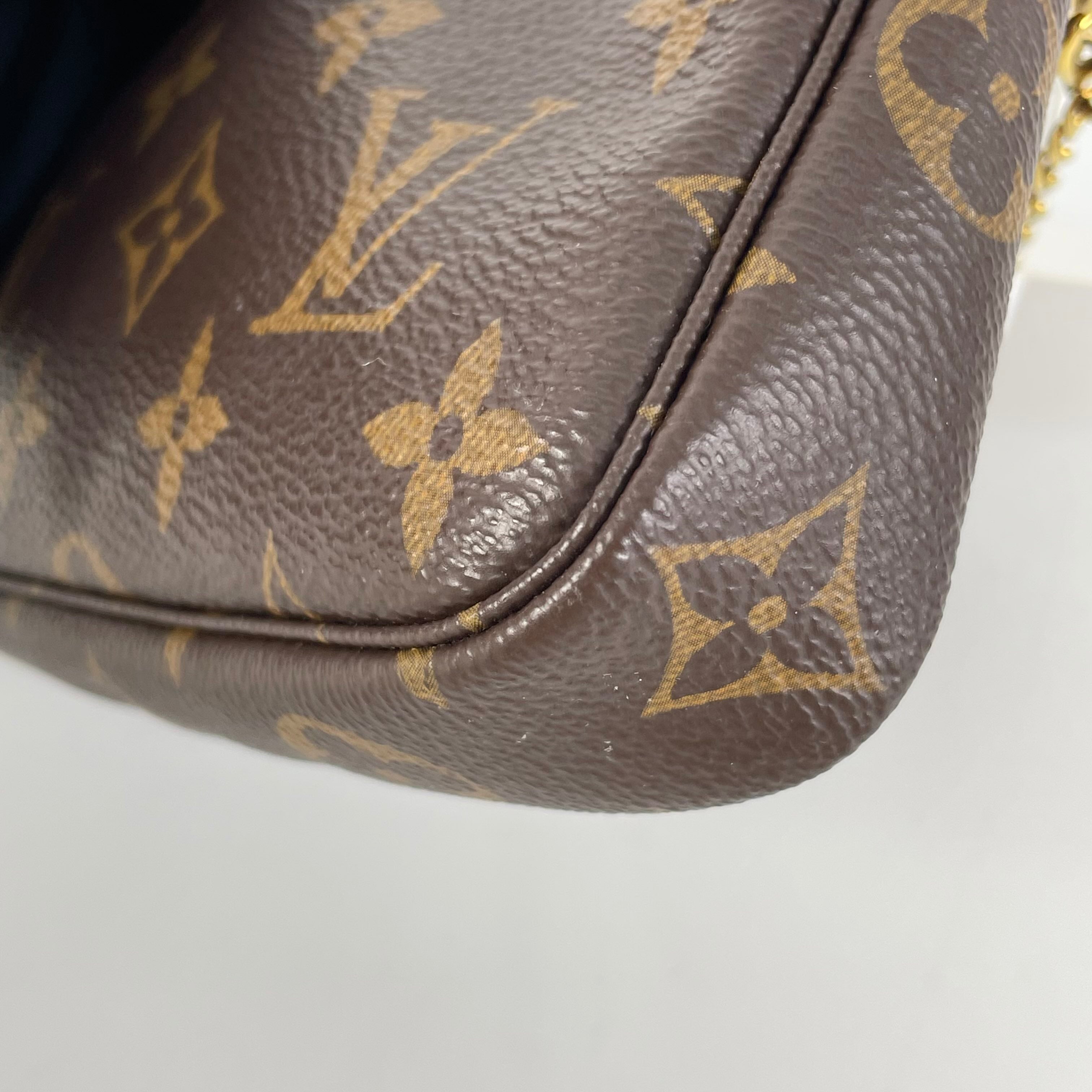 Louis Vuitton Clutch
