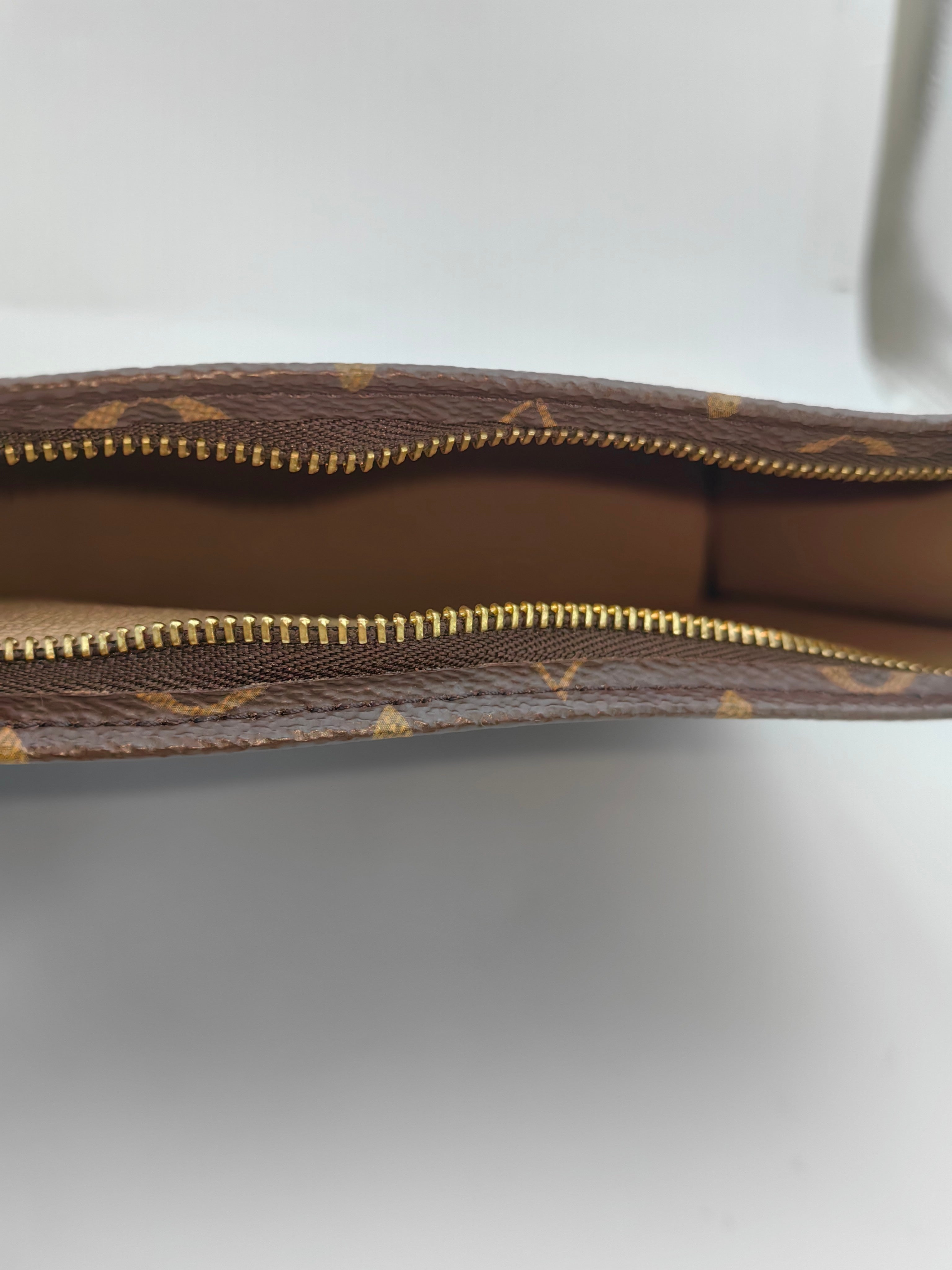 Louis Vuitton Clutch
