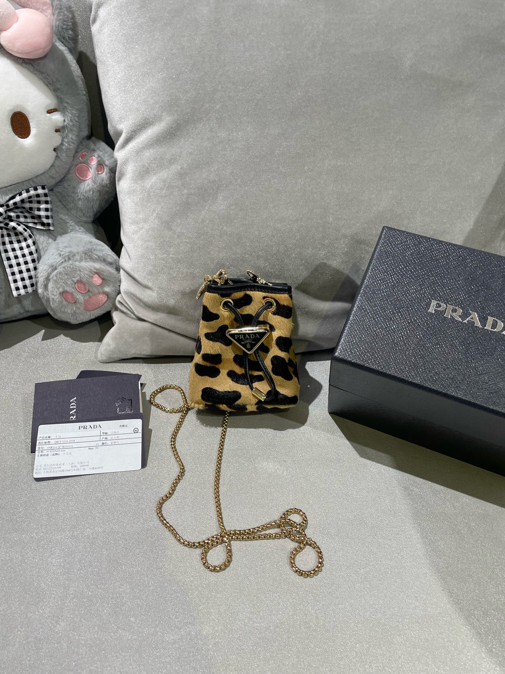 PRADA Printed leather mini clutch bag 1NR016_2C7B_F0151