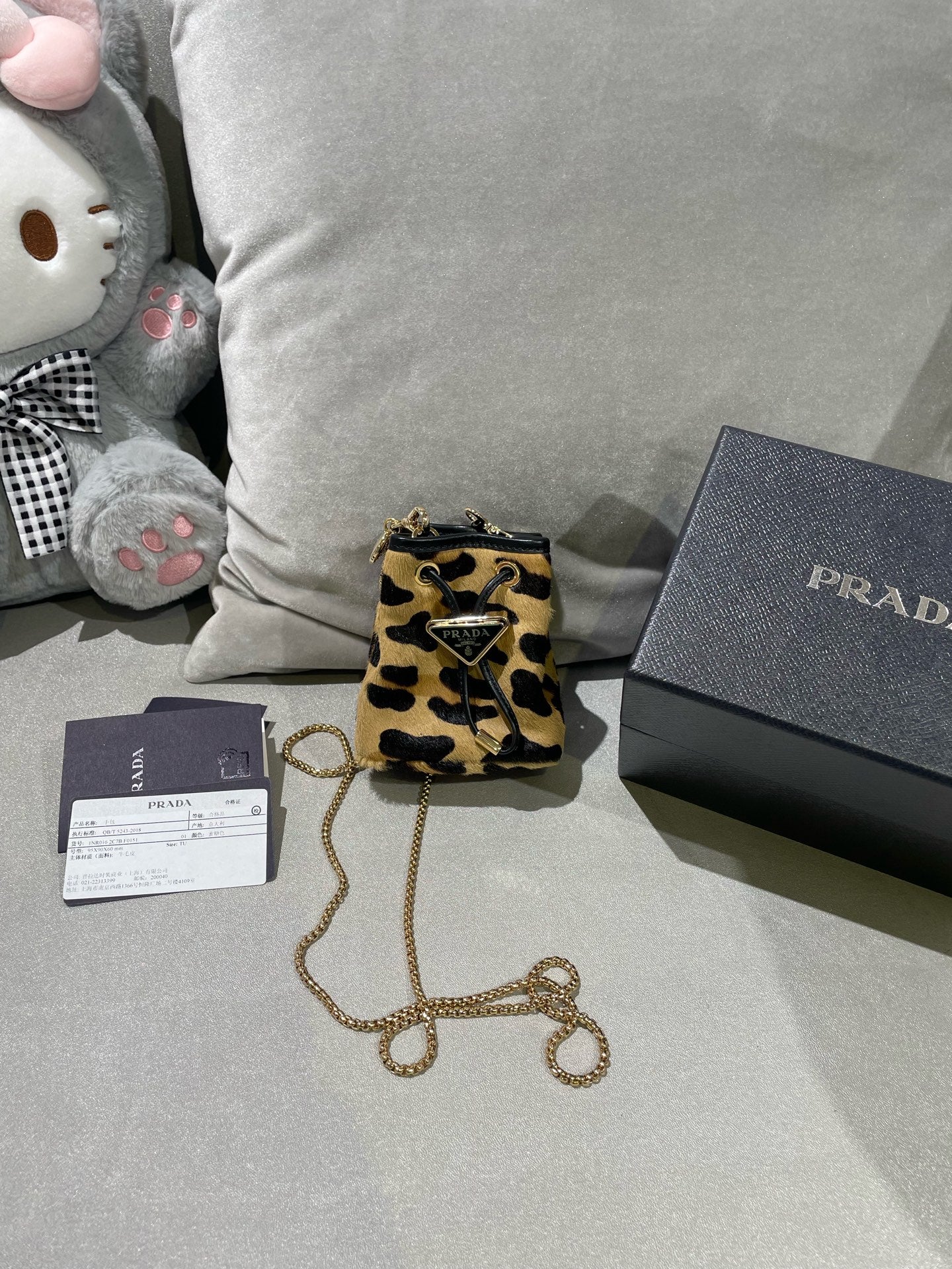 PRADA Printed leather mini clutch bag 1NR016_2C7B_F0151