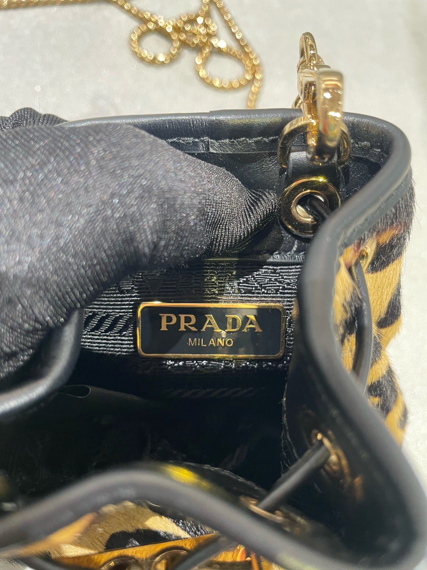PRADA Printed leather mini clutch bag 1NR016_2C7B_F0151