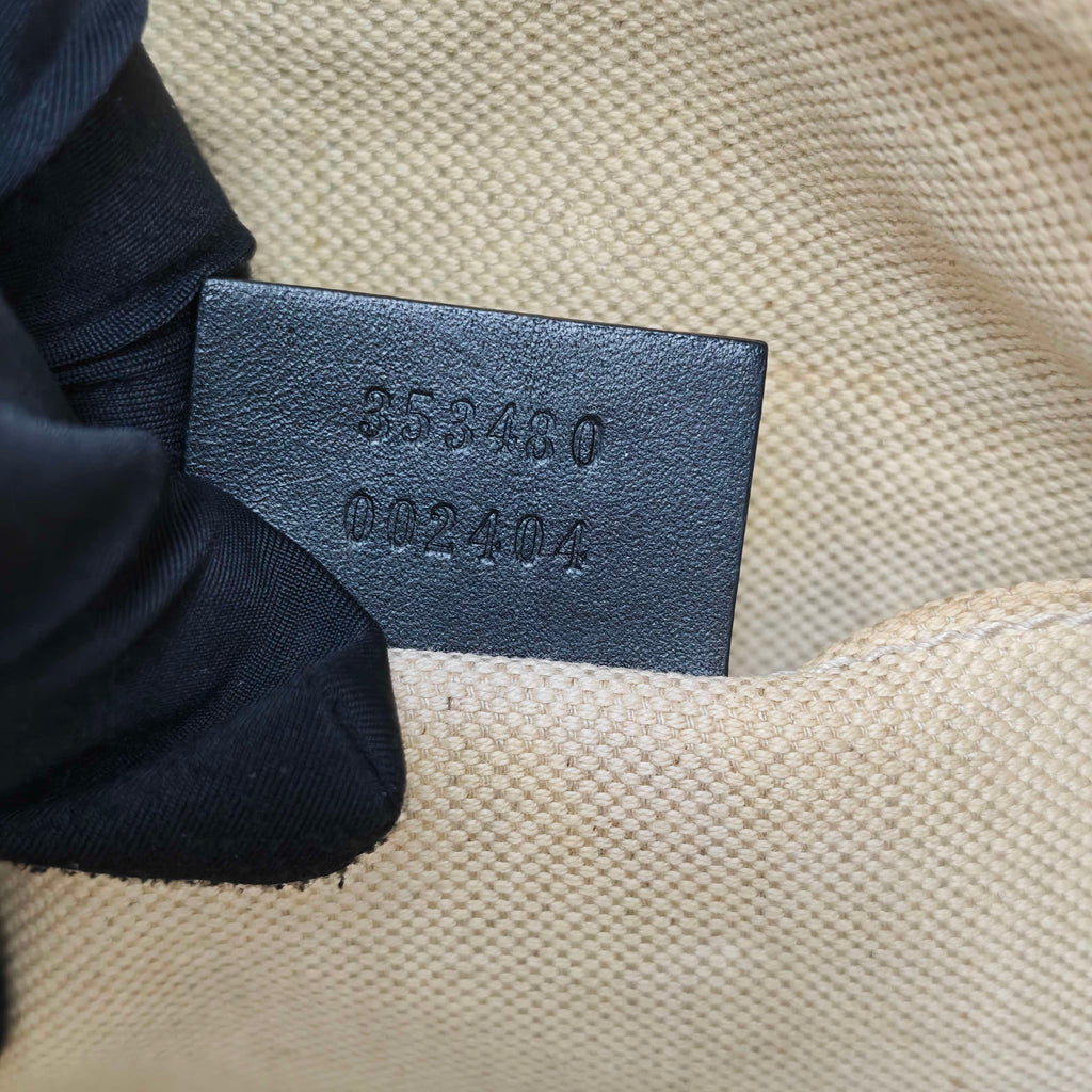 Gucci Canvas Clutch