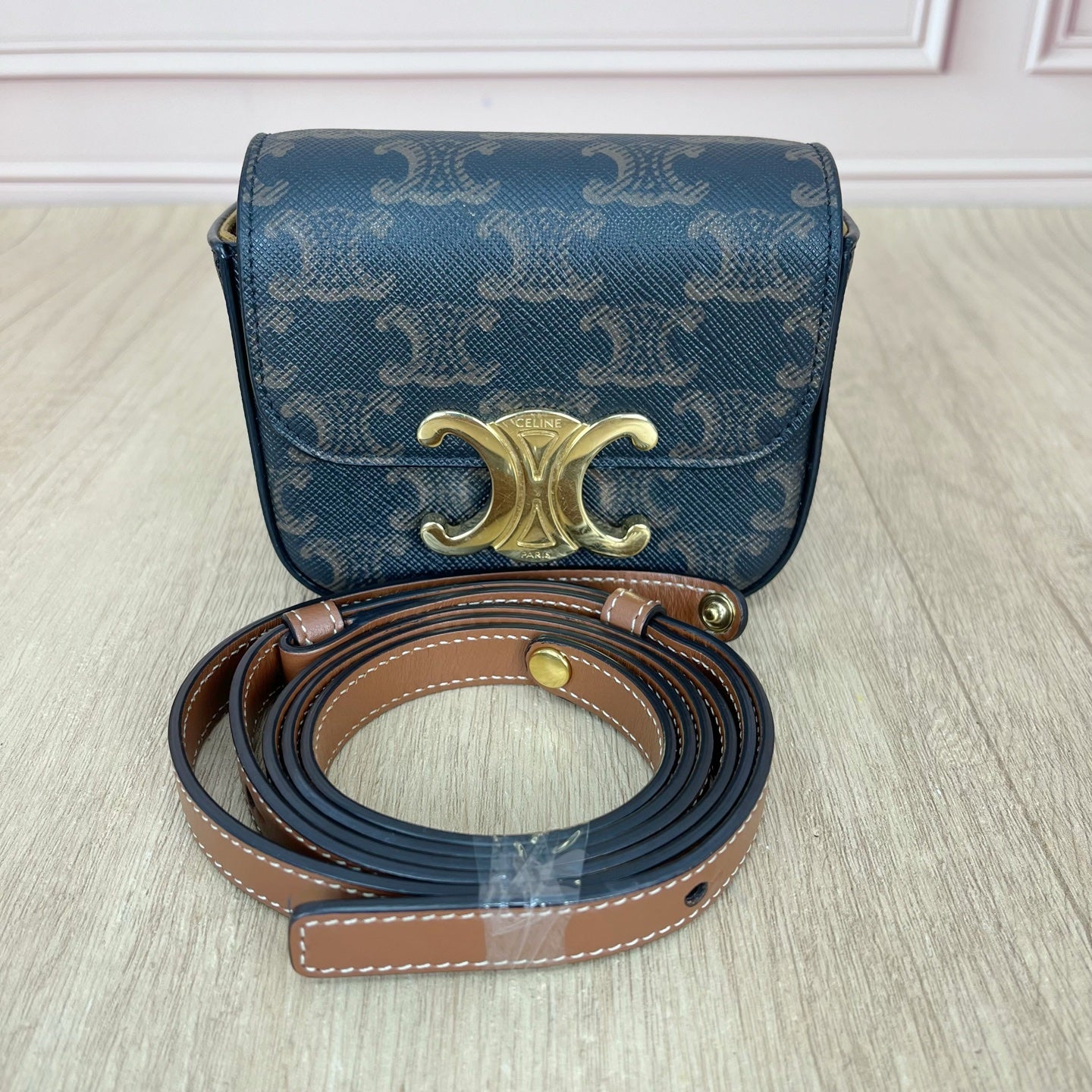 Celine TRIOMPHE mini logo-print calfskin handbag Gold 10I512DQB.04LU