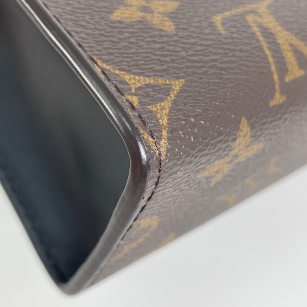 Louis Vuitton Clutch