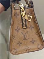 Louis Vuitton Onthego 25 x 13 x 10 M46653