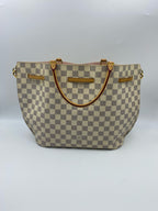 Louis Vuitton Pink Bucket & Drawstring Bag N41579