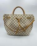 Louis Vuitton Pink Bucket & Drawstring Bag N41579