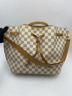 Louis Vuitton Pink Bucket & Drawstring Bag N41579