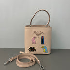Prada Metal Bucket & Drawstring Bag